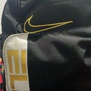 Nike Black Backpack with Gold Detail